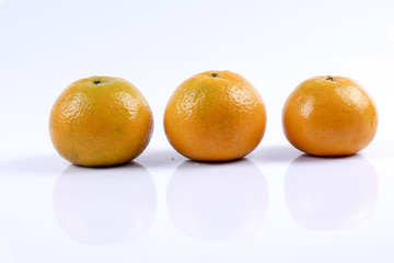 Mandarin orange citrus fruit isolated on white background.
