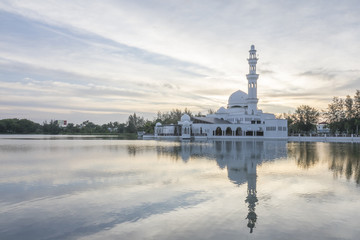 Fototapeta na wymiar Reflections of Tengku Tengah Zaharah Mosque (floating mosque), Kuala Ibai Terengganu, Malaysia