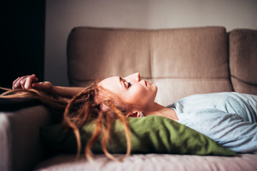 red-haired girl with dreadlocks