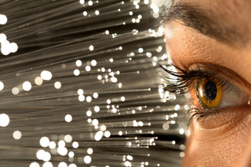 Close up of woman eye in process of scanning