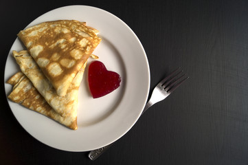 pancakes on a white plate