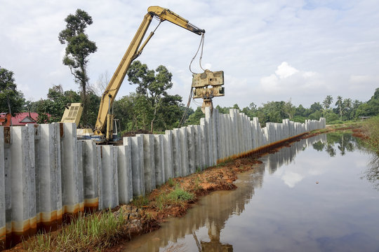 Piling Machine Works  On A Bridge Pile Construction.