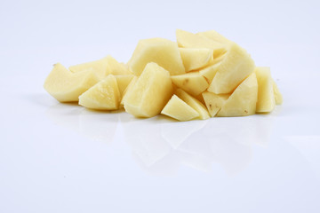 Fresh raw potato on white background.