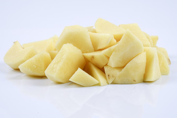 Fresh raw potato on white background.