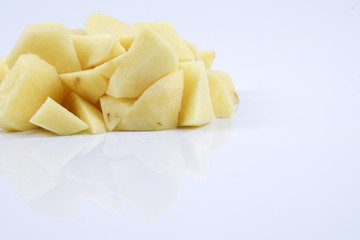 Fresh raw potato on white background.