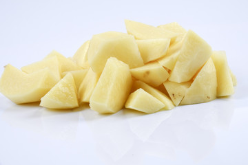 Fresh raw potato on white background.
