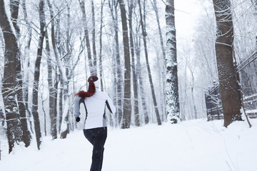 Winter landscape with young girl