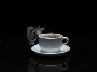 hot coffee with smoke on black background