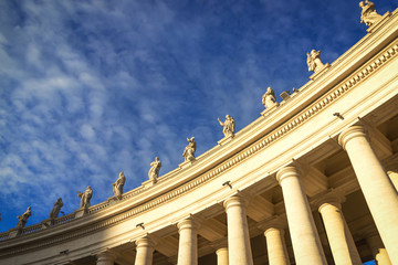 Fototapeta na wymiar Famous colonnade of St. Peter's Basilica in Vatican, Rome, Italy