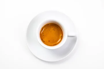 Foto op Plexiglas top view a cup of fresh espresso coffee, close-up © avirid