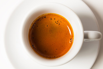 top view a cup of fresh espresso coffee, close-up