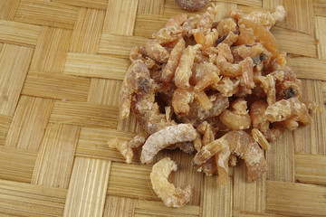 Dried shrimp isolated on wooden background