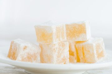 Eastern sweets Turkish delight on a white background closeup