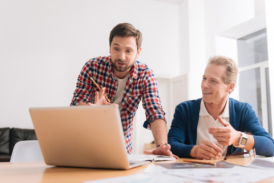 Handsome young man working in the office