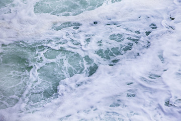 sea foam. foam on the blue sea. background waves
