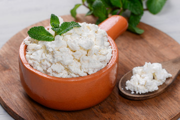 Cottage cheese in a clay pot