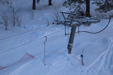 Winter mountains panorama with ski slopes and ski lifts