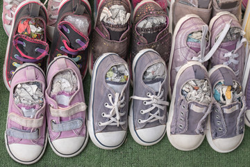 Children shoes / Children shoes on sidewalk in the shop.