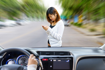 Woman driving fast and dangerous driving. woman using smart phone