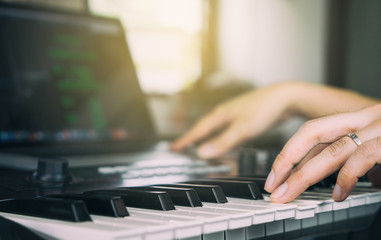 Sound engineer finishing work putting down headphone