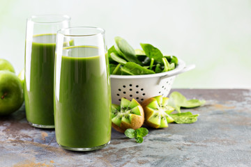 Green juice in tall glasses
