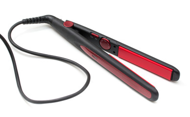 Electric curling iron with ceramic plates isolated on white back