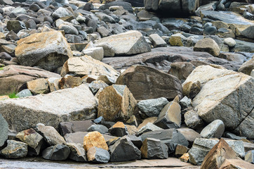 Many sea rocks, big rocks and small rocks