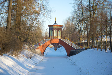 View of Krestovy Bridge (Cross Bridge) in the November snow afternoon. Tsarskoye Selo