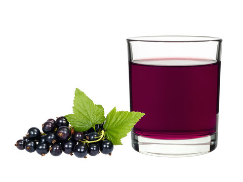 Currant drink in a glass with berries currants