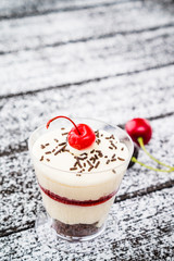 Tasty dessert in glass
