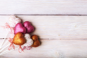 Valentines day hearts over old wooden background with copy space