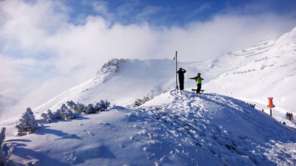Obraz premium Beautiful winter view on top of the mountains