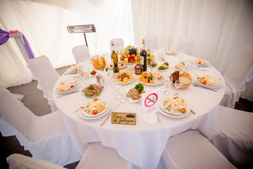 Luxury, elegant wedding reception table arrangement, floral centerpiece