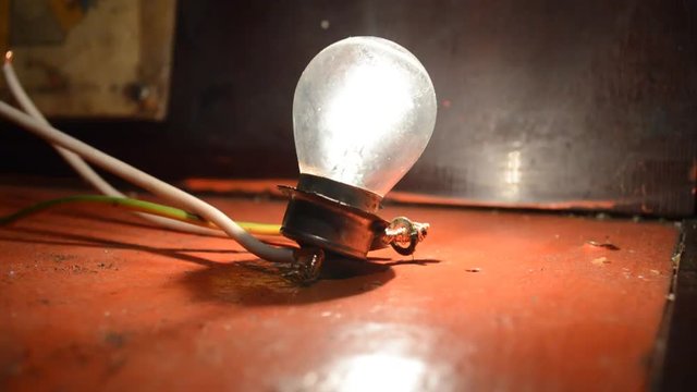 connected light bulb burns brightly and burns