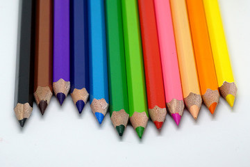 children colorful color pencil on isolated white background