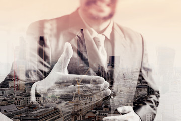 double exposure of businessman with an open hand ready to seal b