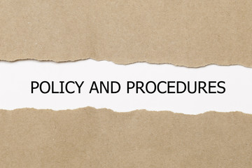 Fototapeta na wymiar Policy And Procedures message written under torn paper.