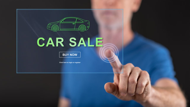 Man touching a car sale concept on a touch screen