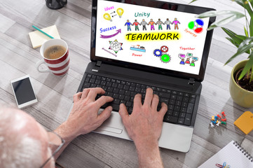 Teamwork concept on a laptop screen