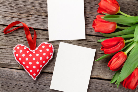 Red tulips, Valentines day heart and photo frames