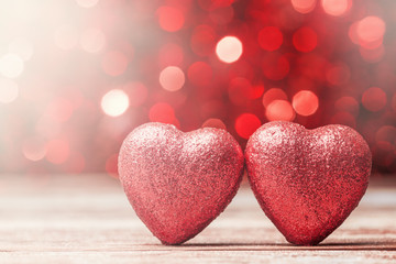 Fototapeta premium Red hearts over abstract background