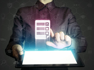 Concept of online testing, questionnaires, voting. Person (man or woman) touches to questionnaire...