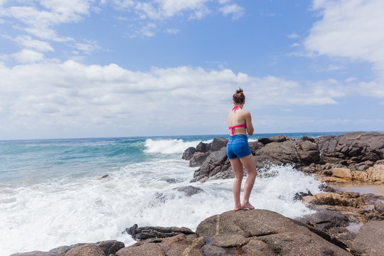 Girl Watching Ocean Waves