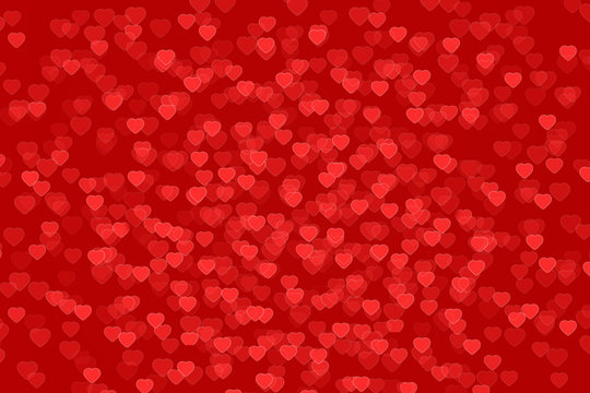 Valentines day background in red color with hearts.