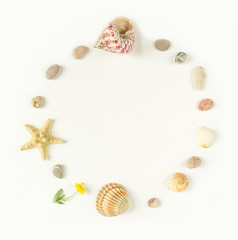 Fototapeta na wymiar Summer background. Seashells, starfish, sea pebbles circle on white background