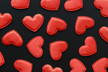 Valentine's Day Background/Theme. Red Hearts On A Black Background. Close-Up. Top View.