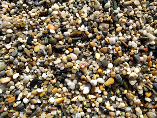 Wet pebbles on the beach
