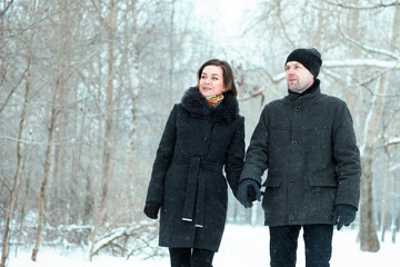 Adult couple resting in park