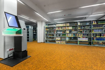 Fotobehang Library interior with modern technology © Dariusz Jarzabek