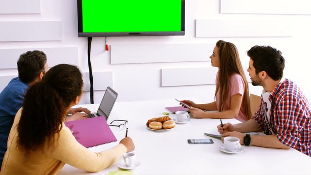 Business executives doing a video conference in the conference room 4k